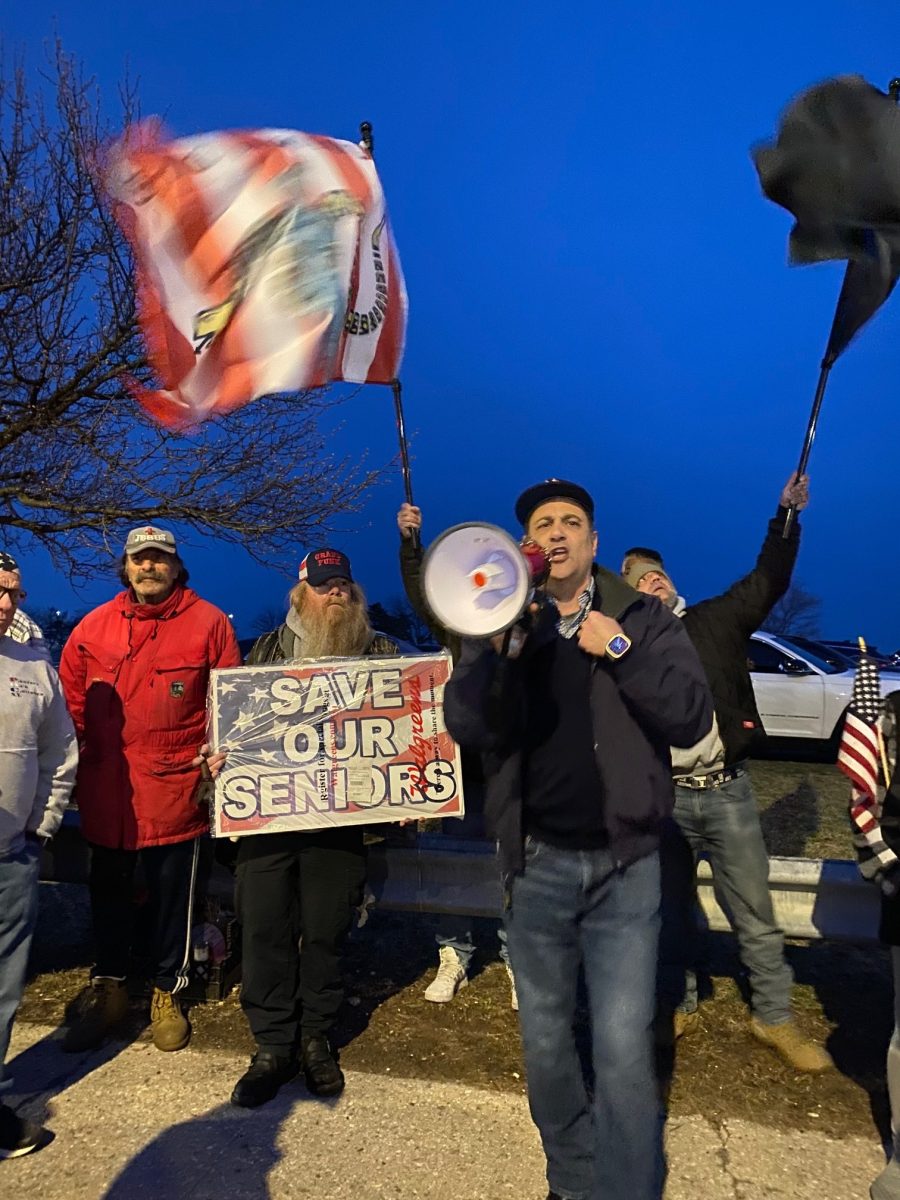 Staten Island state Senator Andrew Lanza speaks in megaphone 