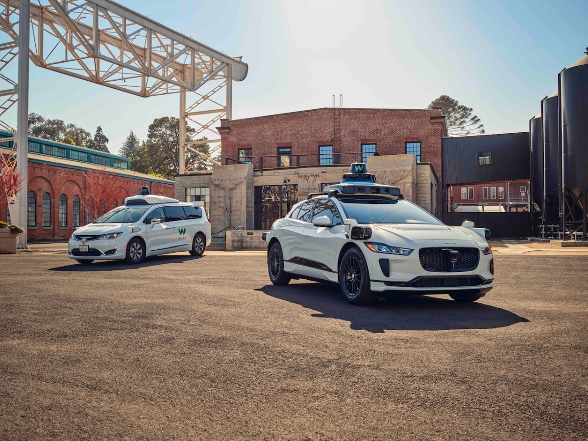 Self-driving cars on sandy lot