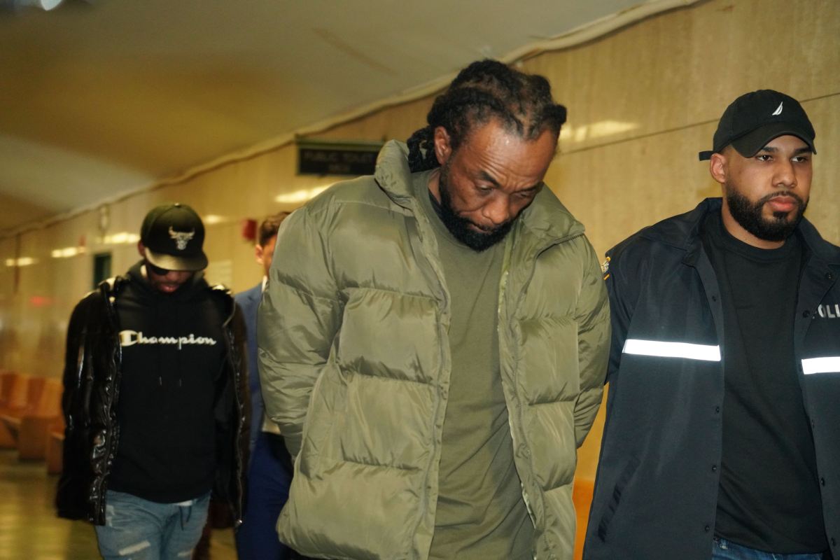 A man arrested in a ghost gun and fraud bust on March 7, 2024 is escorted into a Manhattan Criminal Court room for arraignment