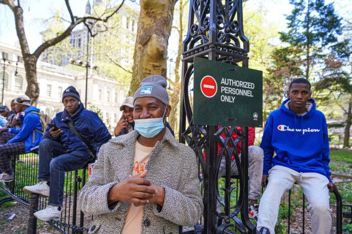 Migrants outside City Hall in NYC