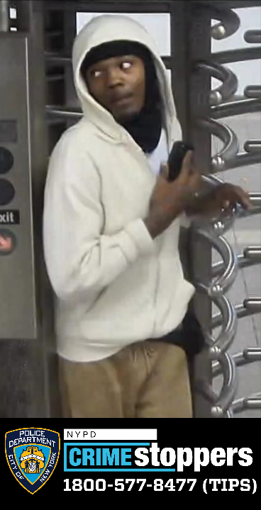 Police are searching for a man who randomly stabbed and slashed a commuter in Midtown early Monday while he was buying a MetroCard, authorities said.NYPD