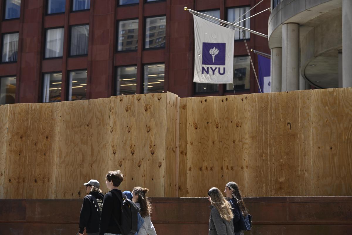 Part of the NYU campus blocked with plywood following demonstrations