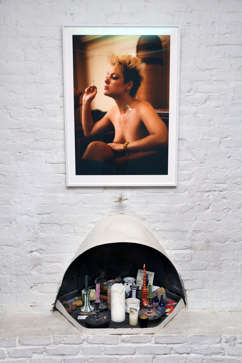 Nitke's on set portrait of Jeanna Fine hangs over the fireplace at Storage APT