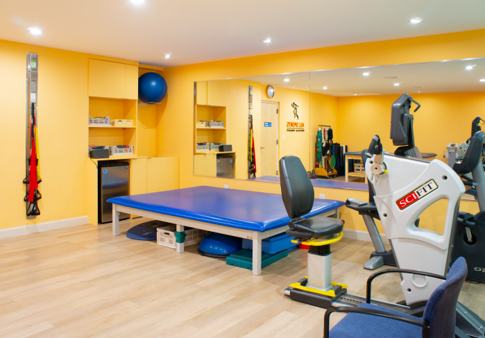 Inside Manhattan's first urgent care center solely focused on fixing bones and joints 3 room with exercise equipment and table at new bone and joint urgicenter on the Upper East Side
