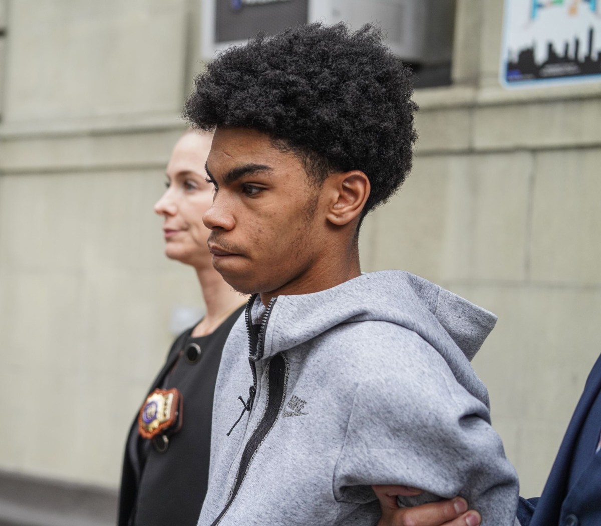 Police cuffed 19-year-old Henry Thomas on Friday. He allegedly gunned down a 16-year-old boy who was attempting to break up a fight outside a school in Soho last week, authorities said