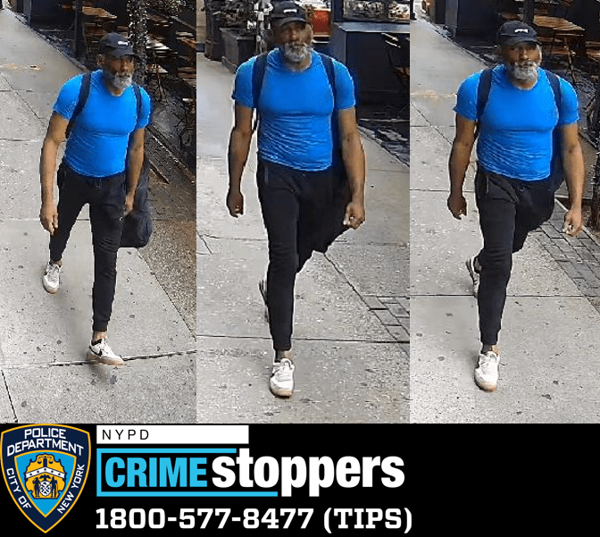 man in blue shirt, black pants wearing backpack wanted for assault in Manhattan