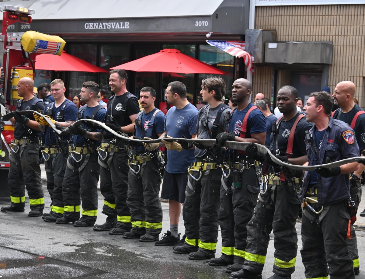 FDNY takes on blaze at Brighton Beach home 6 Firefighters repack hose after battling a basement fire in Brighton Beach