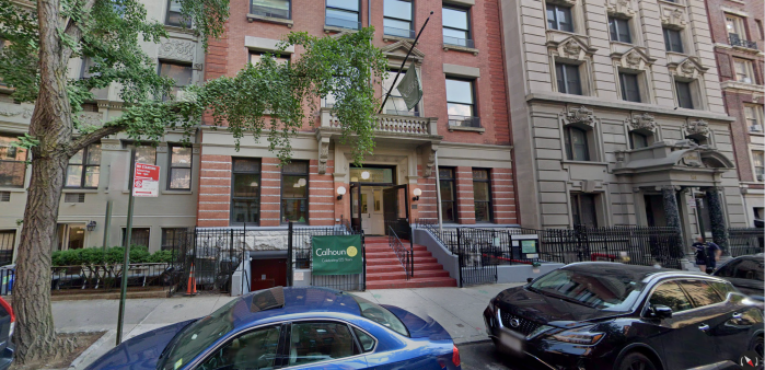 former calhoun school, which is positioned to become a homeless shelter on the upper west side, in the daytime with cars parked in front