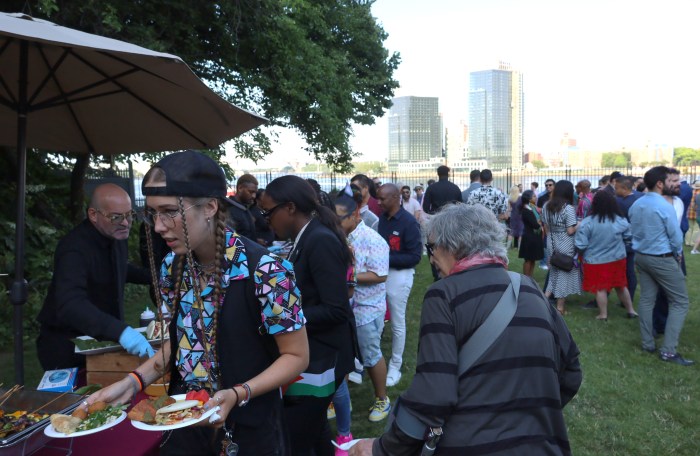 For the entire two hours of the Pride party at Gracie Mansion, the buffet line was relentless