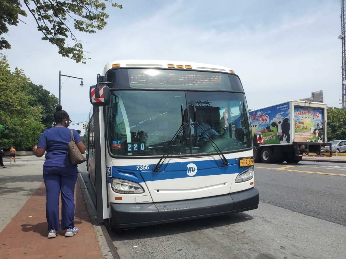 A B41 bus picks up passengers at Flatbush Avenue and Empire Boulevard in Prospect Lefferts Gardens.