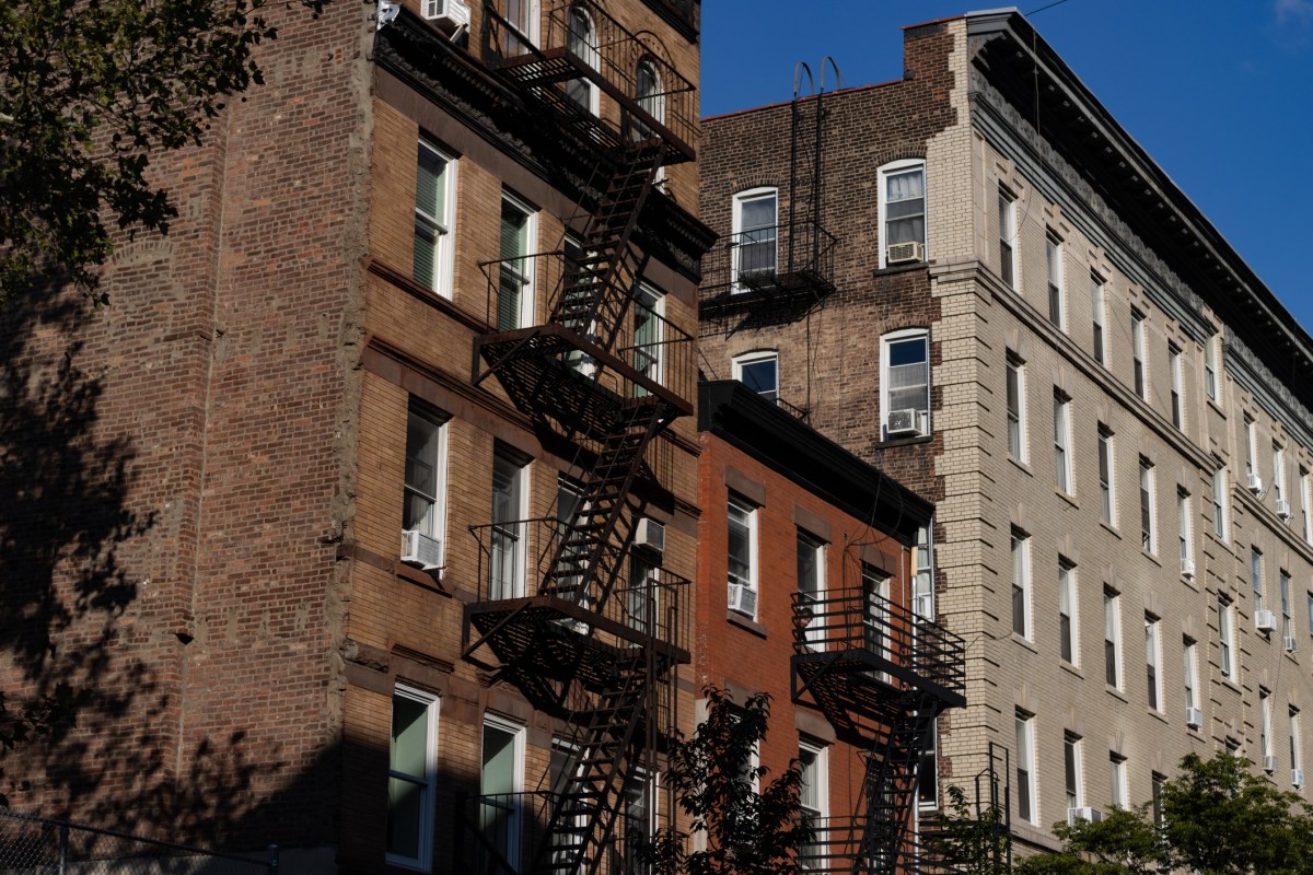 Row of Old Apartment Buildings with Fire Escapes on the Lower East Side of New York City