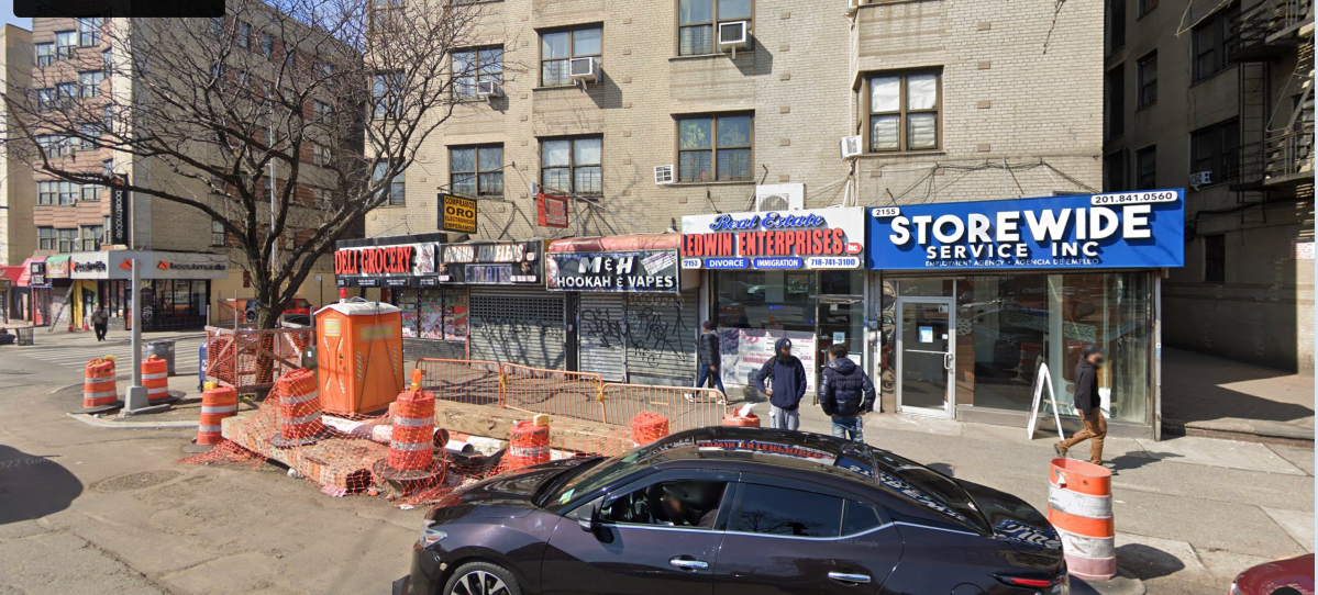 commercial stretch of a Bronx street in the daytime