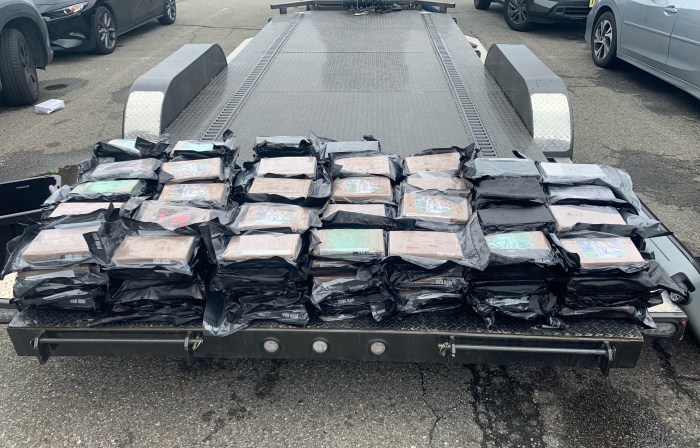 Wide load! Bronx cops cuff 3 drug traffickers found with nearly 360 pounds of cocaine stuffed in truck 2 bricks of cocaine found in a tractor trailer in the Bronx
