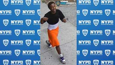 person wearing orange shorts in Brooklyn