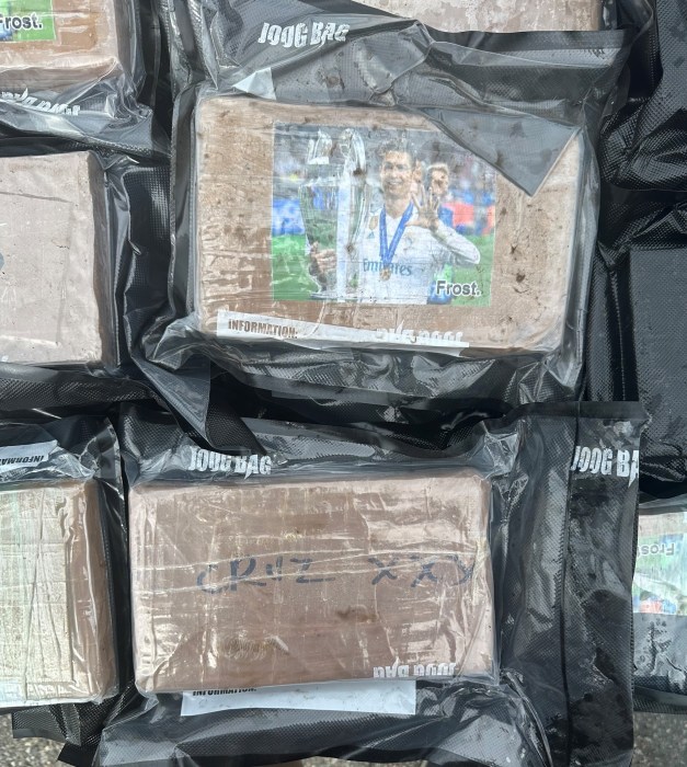 Wide load! Bronx cops cuff 3 drug traffickers found with nearly 360 pounds of cocaine stuffed in truck 3 packages of cocaine