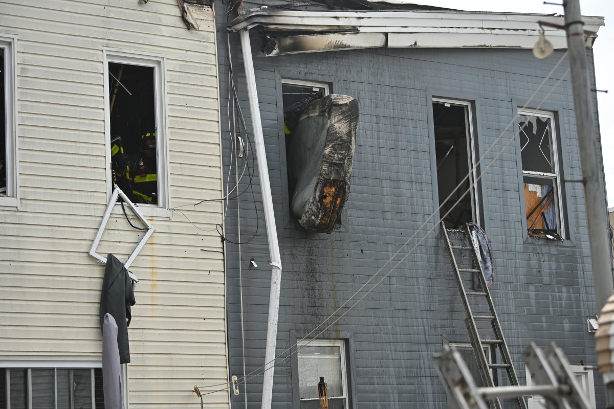 Firefighters take on blaze at Queens home 3 During overhaul members tossed a mattress out the window.
