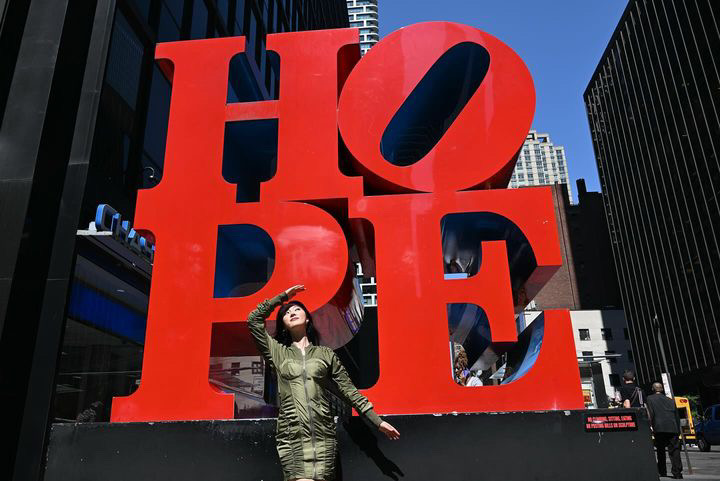 A day with SAAY: South Korean R&B singer talks dark side of industry while exploring city ahead of US debut concert 4 SAAY in front of the HOPE statue in NYC.