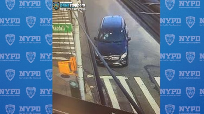 man in Bronx driving a black Mercedes Benz SUV