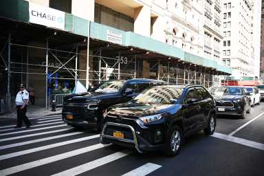 Uber and Lyft drivers in Lower Manhattan.