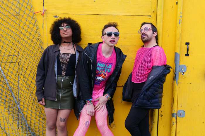 New York City's The FMs to release new album showcasing their late band member's last vocal tracks 7 The band The FMs standing in front of a yellow wall