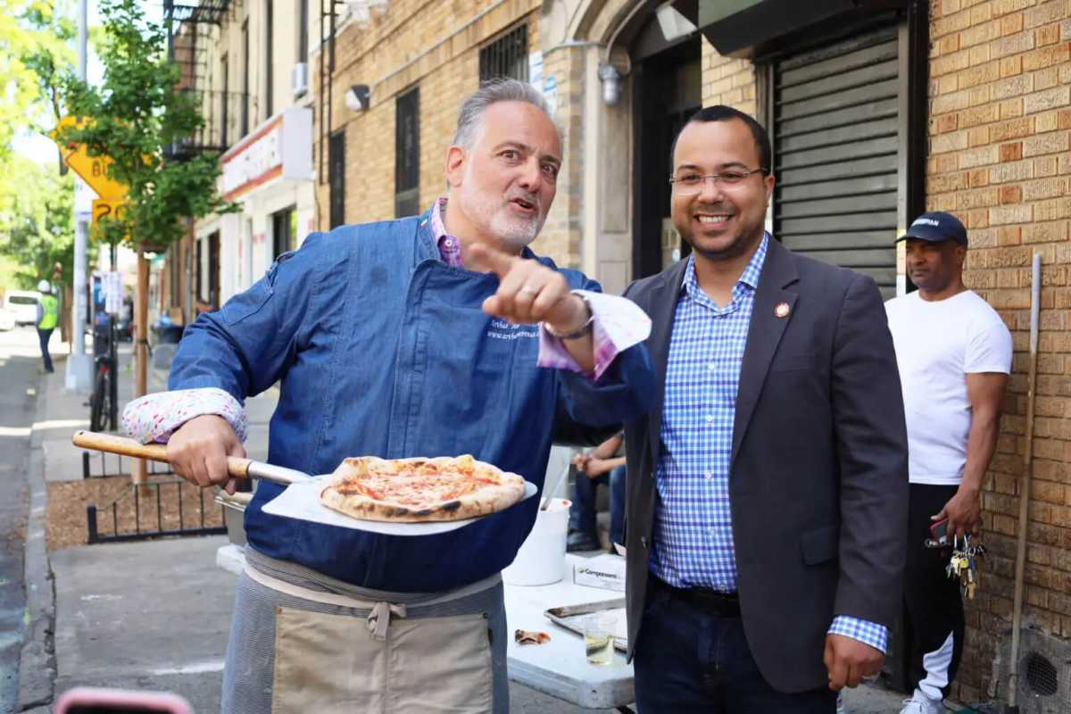 Bronx Council Member Oswald Feliz (pictured on the right) plans to introduce a bill that would help small businesses address fines.