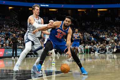 New York Knicks center Karl-Anthony Towns (32) dribbles the ball against Orlando Magic forward Moritz Wagner (21) in the second quarter at Kia Center.