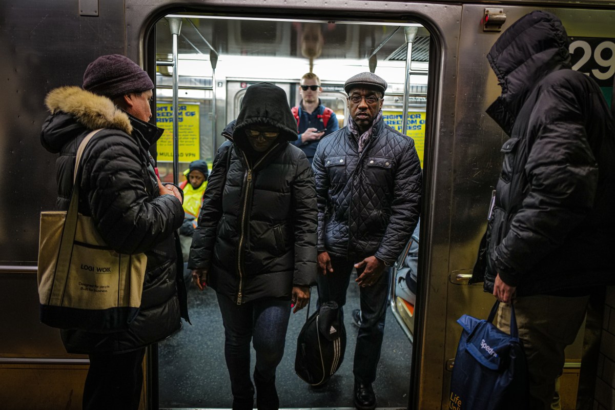 Gaps in MTA funding could threaten capital projects, cost taxpayers more cash: new report 2 MTA subway riders depart train