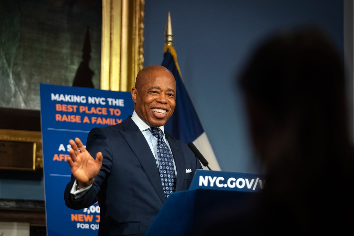 Mayor Adams smiling at press conference