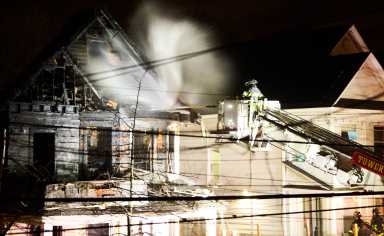 Staten Island firefighter pours water on fire