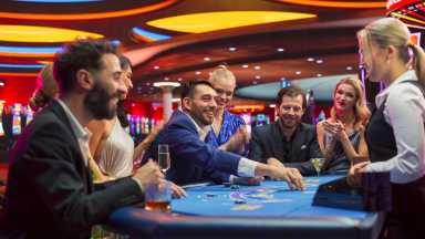 People playing blackjack in a casino