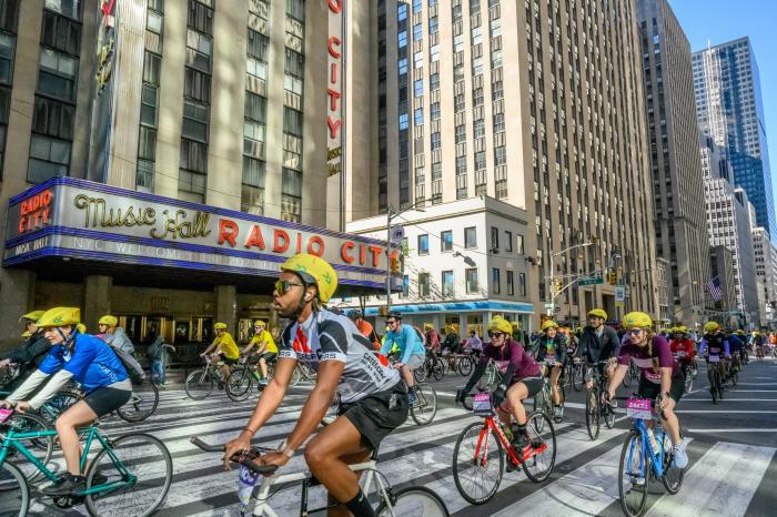 TD Five Boro Bike Tour through NYC: What you need to know about the Big Apple's biggest cycling event 3 bicyclists in NYC participating in the TD Five Boro Bike Tour.