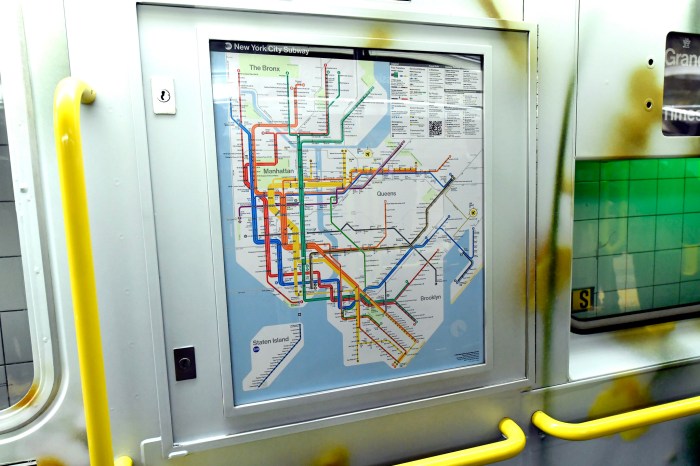 new NYC subway map displayed in a train