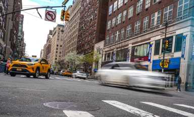 cars driving on the road in NYC