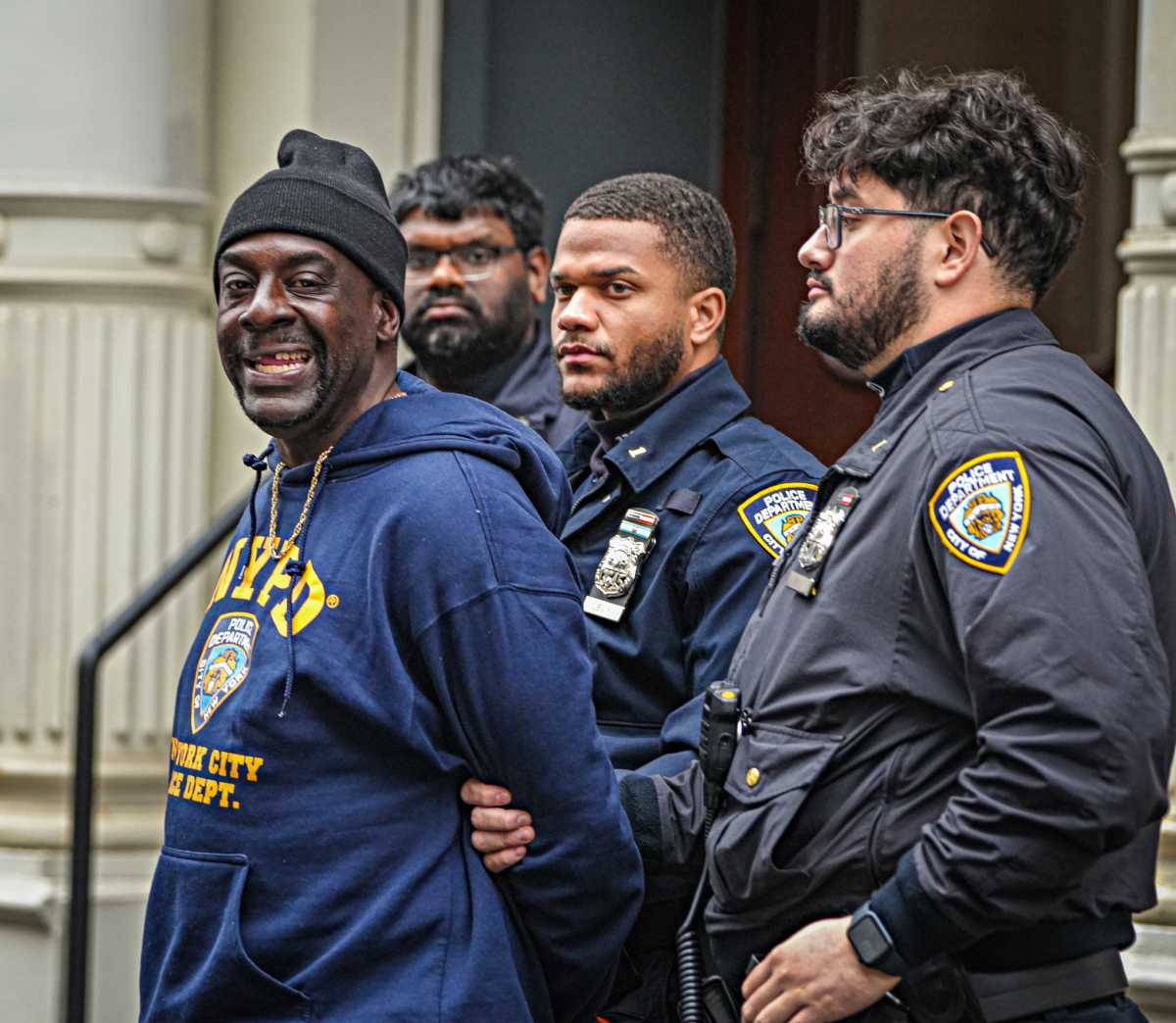 Soho slashing suspect indicted on attempted murder charges for attacking woman in gory glass assault 3 Suspect smiles after being arrested for SoHo stabbing