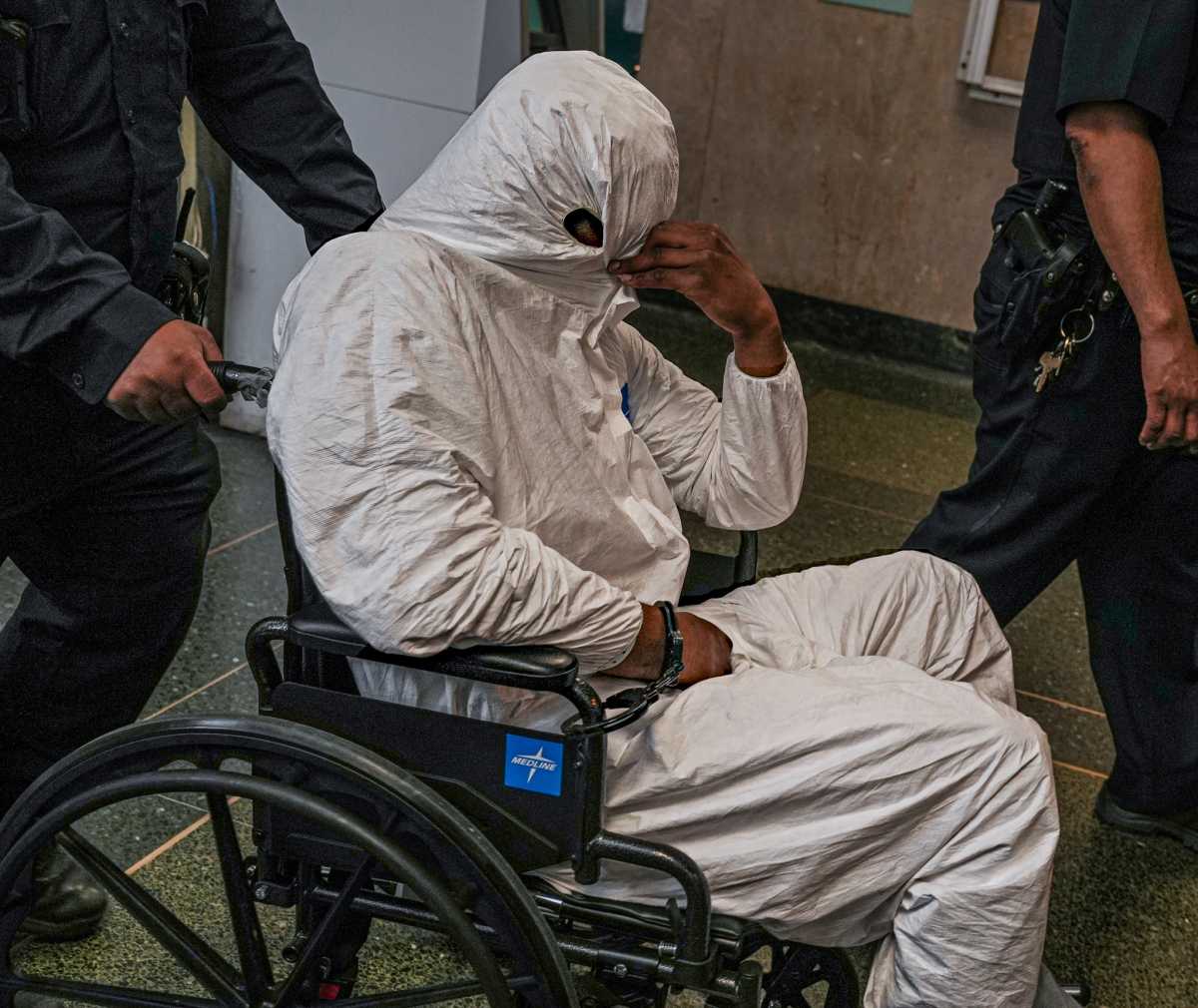 Gunman who allegedly started Harlem shootout that killed grandmother hides face from media at court 3