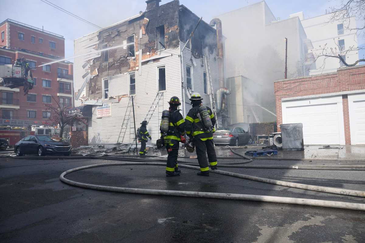 Four-alarm fire rips through Queens buildings in borough's latest blaze of a fiery weekend 4
