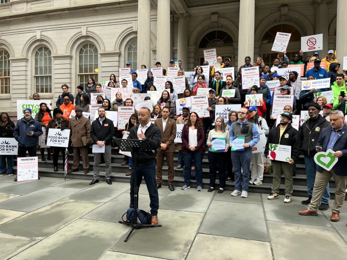 food bank advocates rally on steps of City Hall as prices can potentially increase at NYC supermarkets