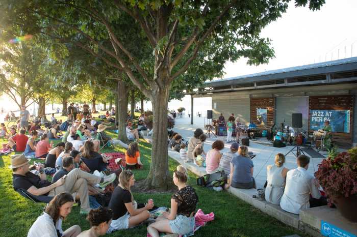 people at a daytime jazz concert outside at Hudson River Park