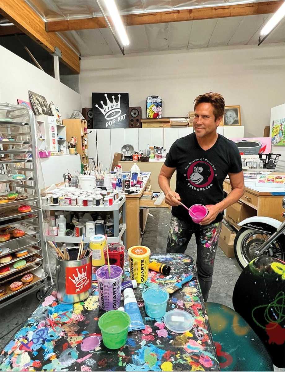 Nelson De La Nuez’s 'Made in America' promises pop, precision and provocation 2 Nelson De La Nuez painting at Popland Studios