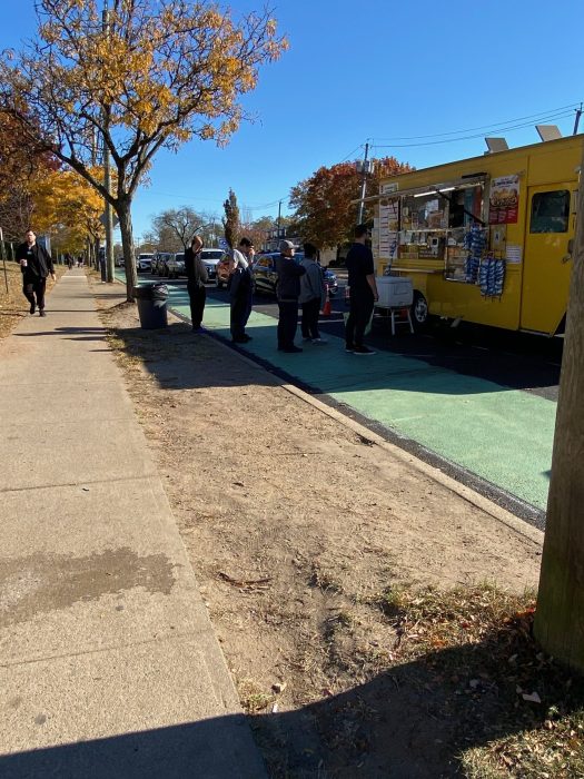 DOT touts Seaview Avenue street-safety redesign as Staten Islanders claim it’s now 'more dangerous' than ever 3 people waiting on line to order at a food truck