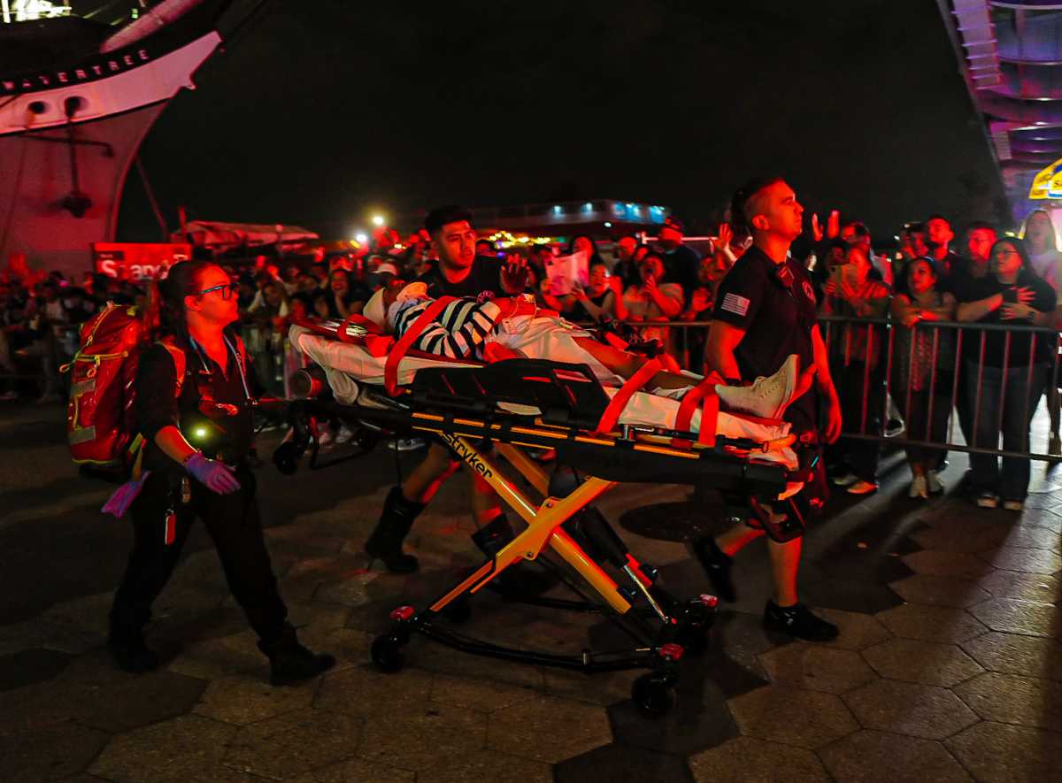 First responders rescue man on stretcher after ship crashed into Brooklyn Bridge