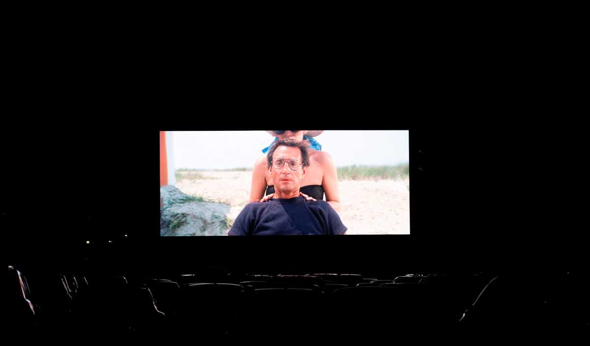 People watching Jaws in movie theater