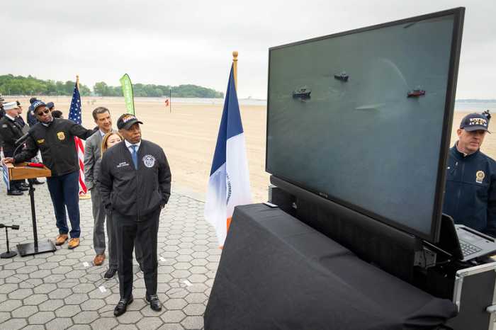 City to trial flotation device-dropping drones for beach swimmers in distress this summer 2 Mayor Eric Adams watches on as emergency responders demonstrate a rescue drone at Orchard Beach. He joked that his voice should be used in the drone’s speaker system because it is “calming.”