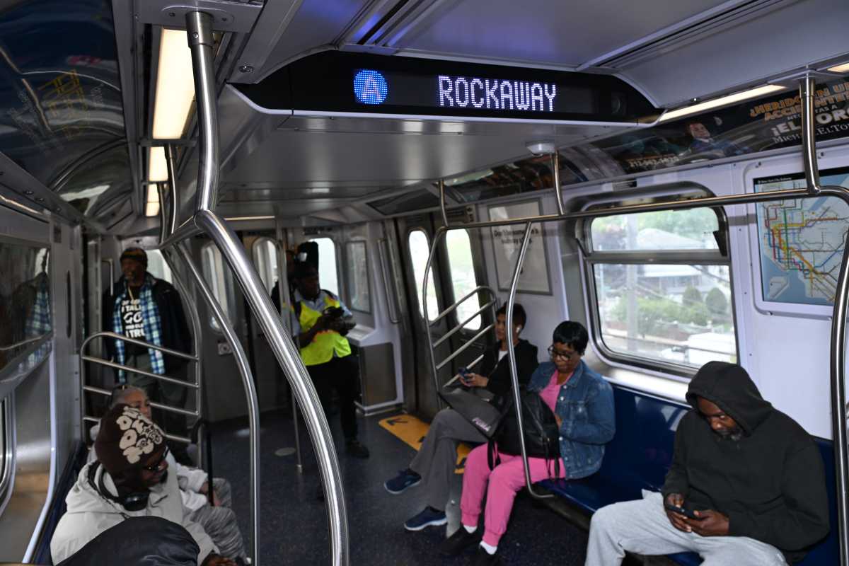 NYC public transit is on track for 'record year' of ridership and performance, Hochul says 2 NYC Transit riders on board an A train in the Rockaways