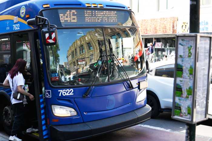 Fare evasion: MTA battling scourge of scofflaws boarding buses without paying their fair share 5 people boarding a NYC bus