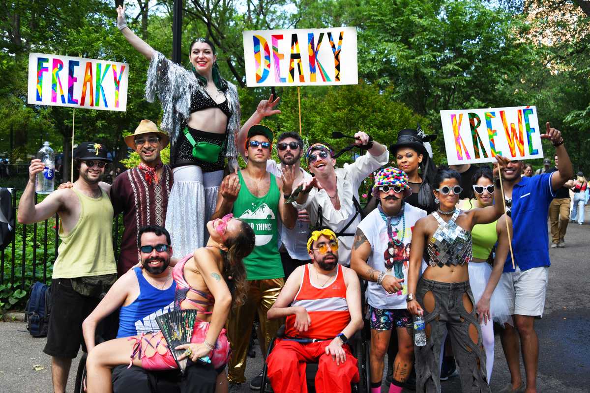 SEE IT: Dance Parade and Fest in East Village moves to the beat of the city 2 People holding signs at Dance Parade and Dance Fest in East Village