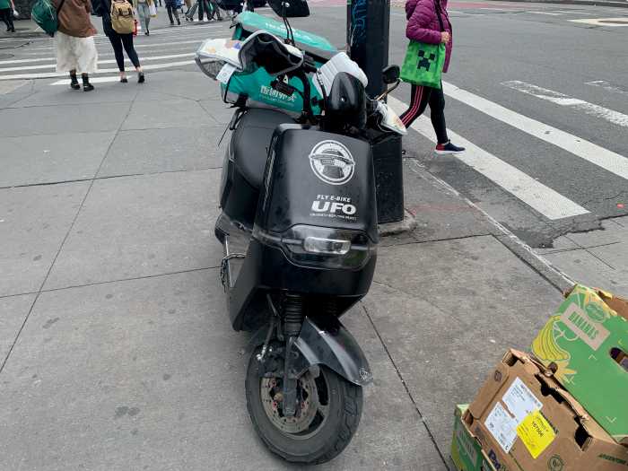 Wild west side: Manhattan community board committee strikes down NYPD policy targeting ‘bike cowboys’ who break traffic laws 2 a parked moped on a NYC street