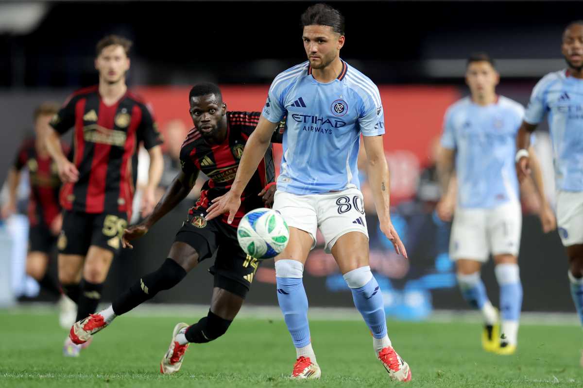 Jun 12, 2025; New York, New York, USA; New York City FC midfielder Justin Haak (80) controls the ball against Atlanta United forward Jamal Thiare (14) during the second half at Yankee Stadium. Mandatory Credit: Brad Penner-Imagn Images