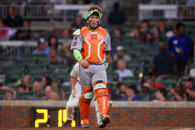 Francisco Alvarez Mets: Man in catcher's gear walking toward camera