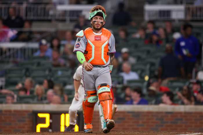 Francisco Alvarez Mets: Man in catcher's gear walking toward camera